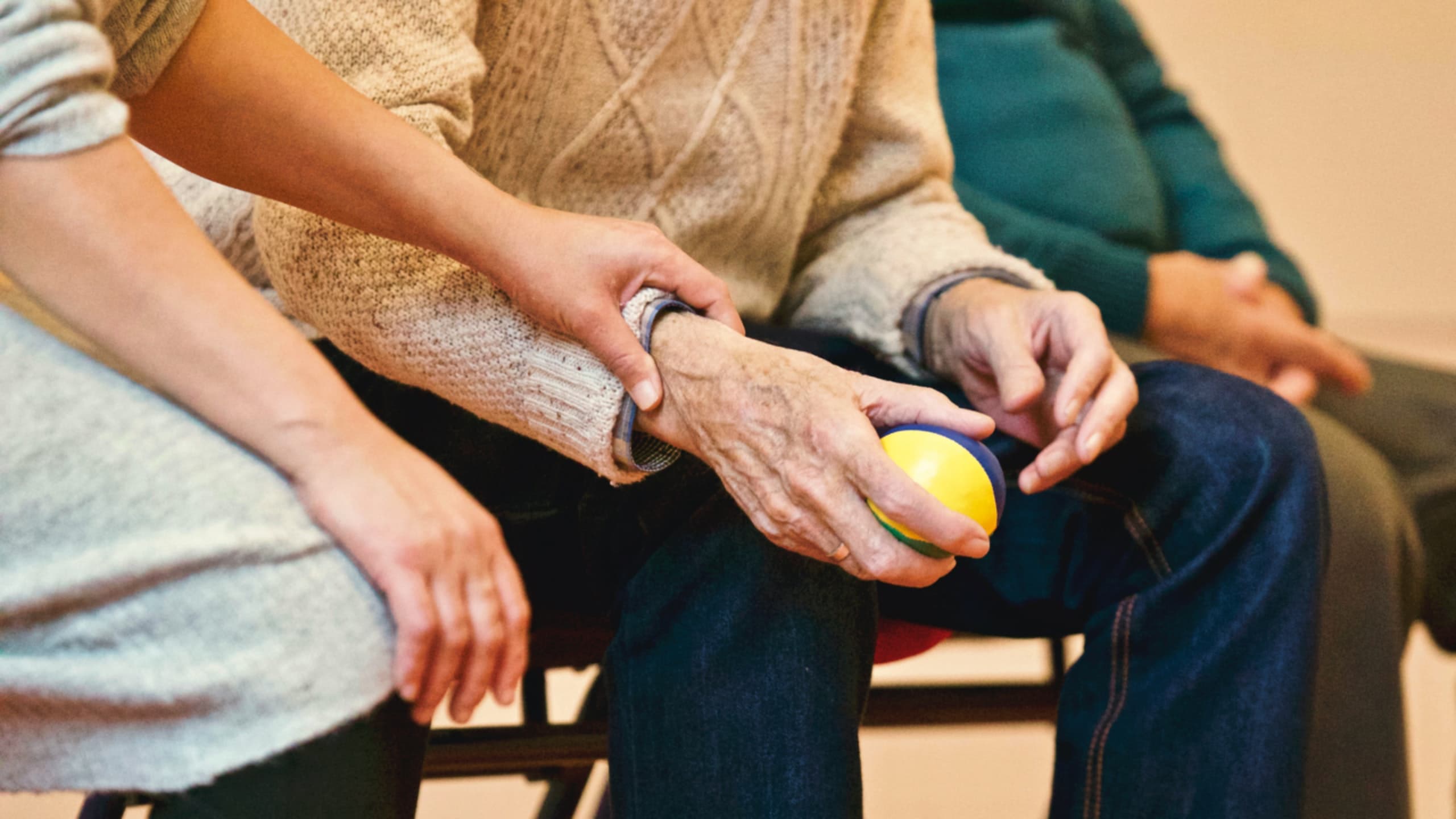 Elderly men and women in nursing home